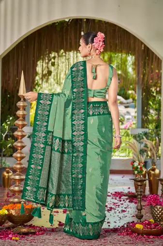 Women emerald green silk blend banarasi jacquard woven saree with blouse