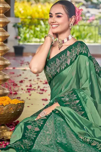 Women emerald green silk blend banarasi jacquard woven saree with blouse