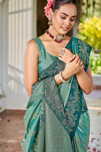 Women sea green silk blend banarasi jacquard woven saree with blouse