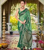 Women emerald green silk blend banarasi jacquard woven saree with blouse