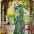 Women emerald green silk blend banarasi jacquard woven saree with blouse