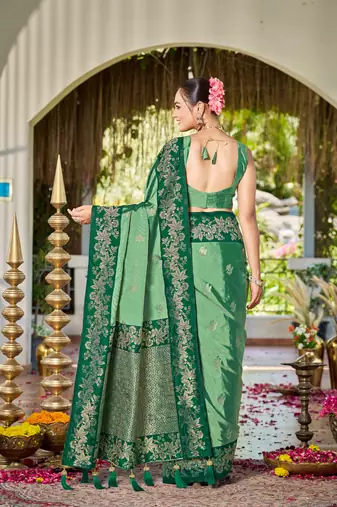 Women emerald green silk blend banarasi jacquard woven saree with blouse