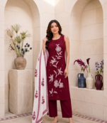 Red embroidered sleeveless kurti set with trousers and white contrast dupatta