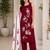 Red embroidered sleeveless kurti set with trousers and white contrast dupatta