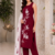 Red embroidered sleeveless kurti set with trousers and white contrast dupatta