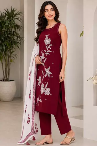 Red embroidered sleeveless kurti set with trousers and white contrast dupatta