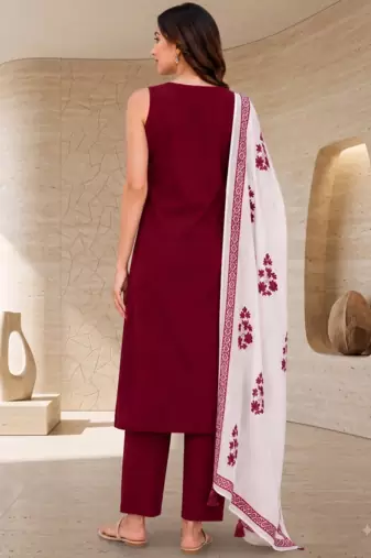Red embroidered sleeveless kurti set with trousers and white contrast dupatta