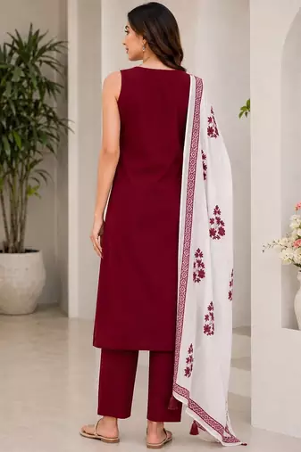Red embroidered sleeveless kurti set with trousers and white contrast dupatta