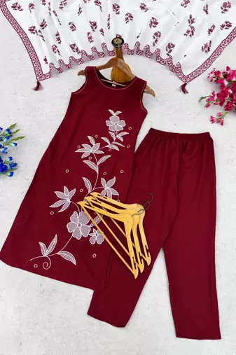 Red embroidered sleeveless kurti set with trousers and white contrast dupatta
