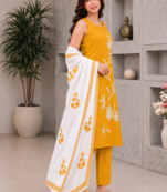 Mustard yellow embroidered sleeveless kurti set with trousers and white contrast dupatta