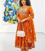 Orange cotton floral printed flared kurta set with dupatta