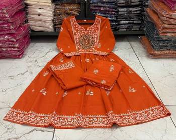 Orange cotton floral printed flared kurta set with dupatta 3