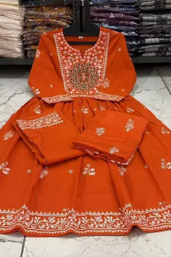 Orange cotton floral printed flared kurta set with dupatta
