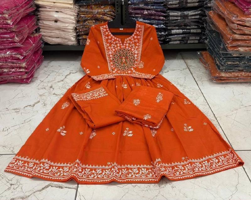 Orange cotton floral printed flared kurta set with dupatta
