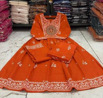 Orange cotton floral printed flared kurta set with dupatta 4