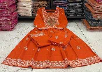 Orange cotton floral printed flared kurta set with dupatta 5