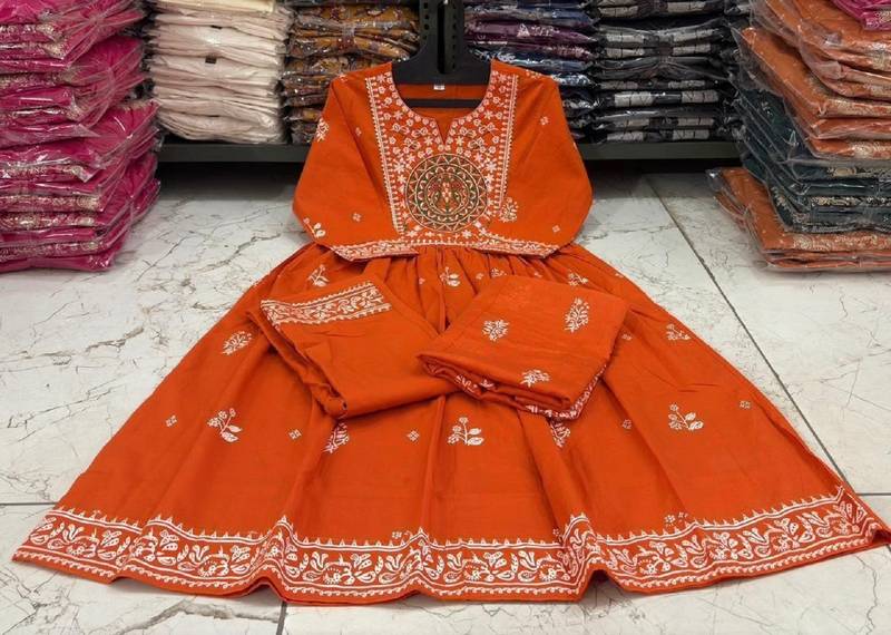 Orange cotton floral printed flared kurta set with dupatta