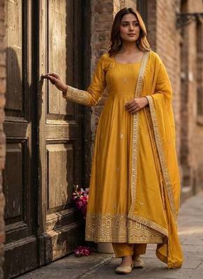 yellow color embroidery sequin work silk blend gown set 1