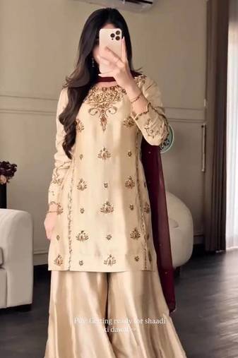 cream color embroidery sequin work crepe kurti sharara set