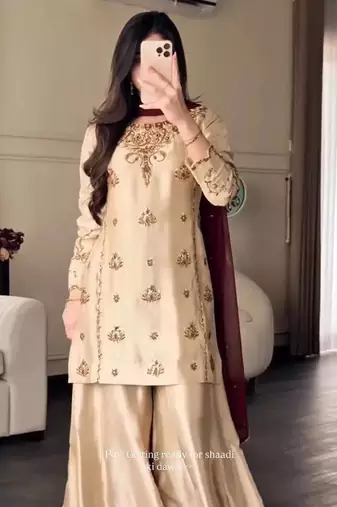 cream color embroidery sequin work crepe kurti sharara set