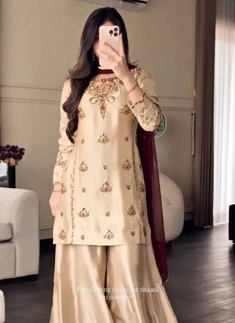cream color embroidery sequin work crepe kurti sharara set
