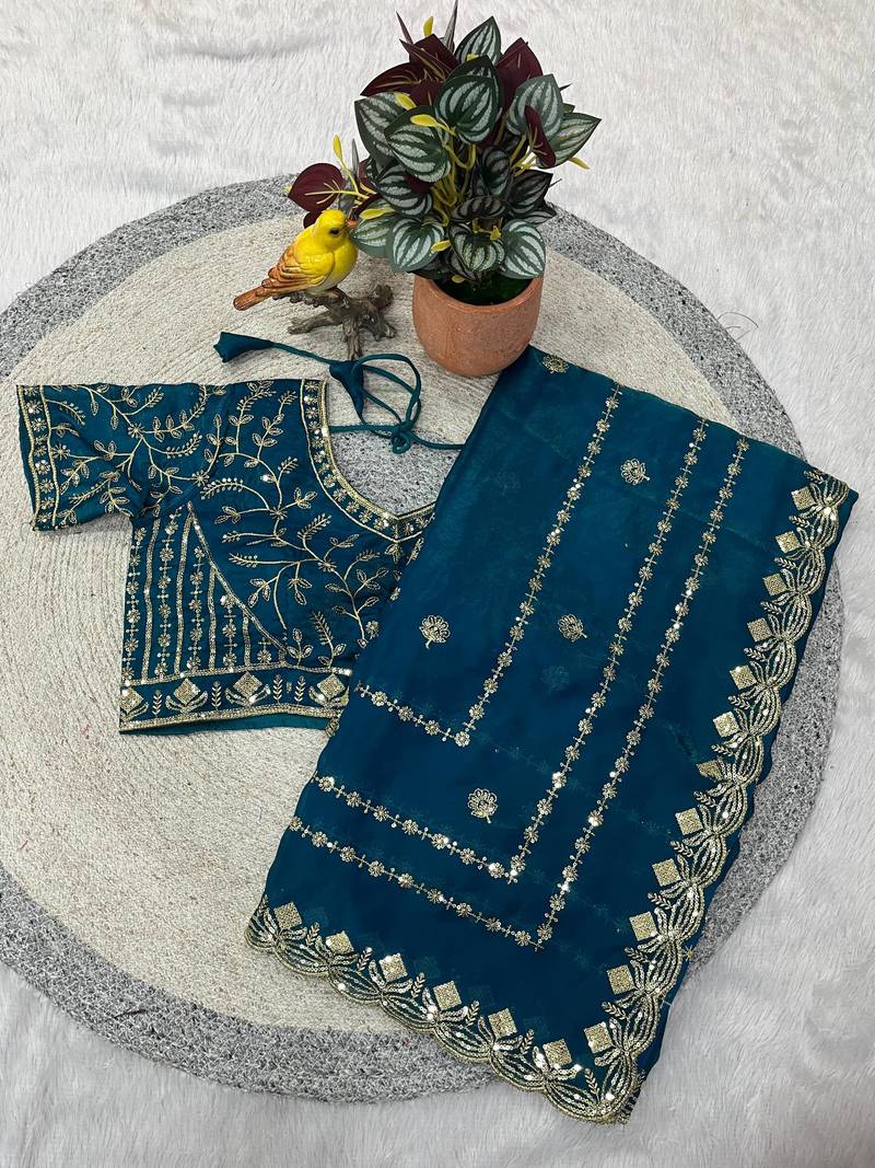 teal color designer embroidery work sequins jarl thread with cutwork border  satin silk blend saree