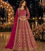Rani pink embroidered net semi stitched anarkali suit