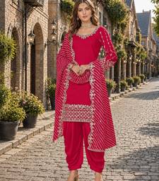Red roman silk semi stitched suit with embroidery & real mirror work