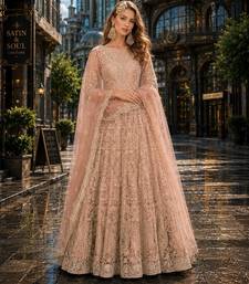 Peach embroidered net semi stitched anarkali suit