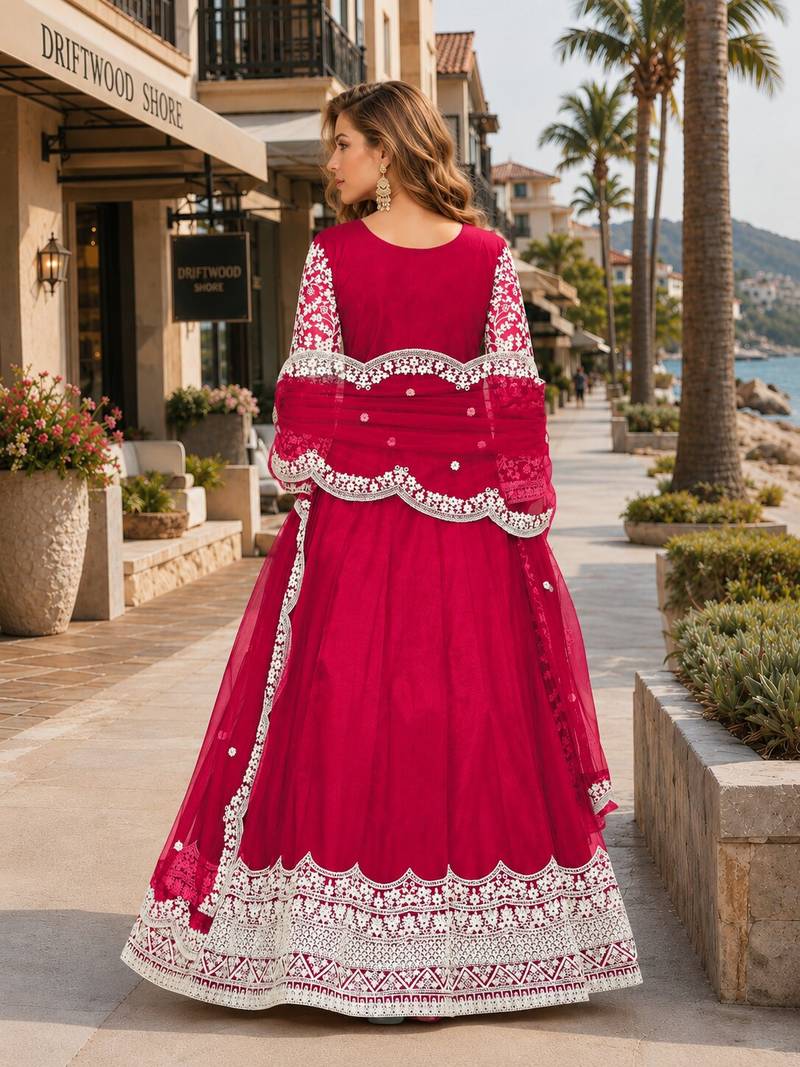 Magenta embroidered net semi stitched anarkali suit
