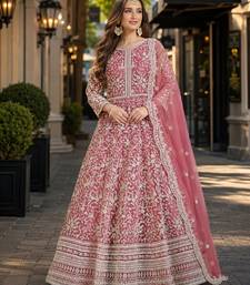 Pink embroidered net semi stitched anarkali suit