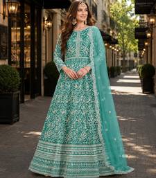 Sea green embroidered net semi stitched anarkali suit