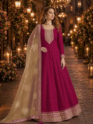 Rani pink embroidered jacquard chanderi semi stitched anarkali suit 1
