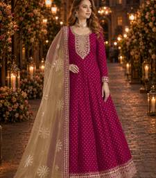 Rani pink embroidered jacquard chanderi semi stitched anarkali suit
