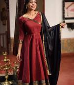 Maroon silk zari woven flared gown set