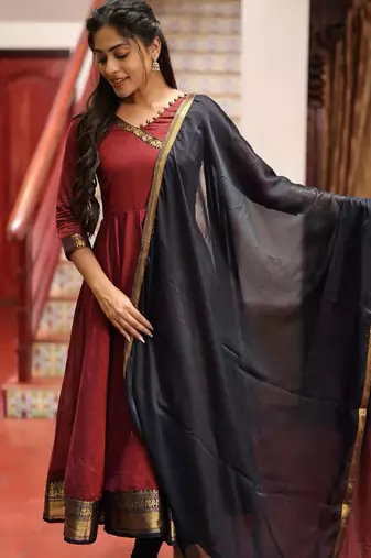 Maroon silk zari woven flared gown set