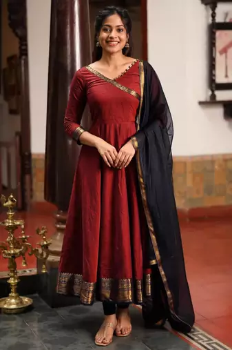 Maroon silk zari woven flared gown set