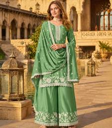 Green heavy chinon semi stitched palazzo suit with embroidey work