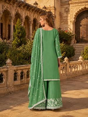 Green heavy chinon semi stitched palazzo suit with embroidey work 2
