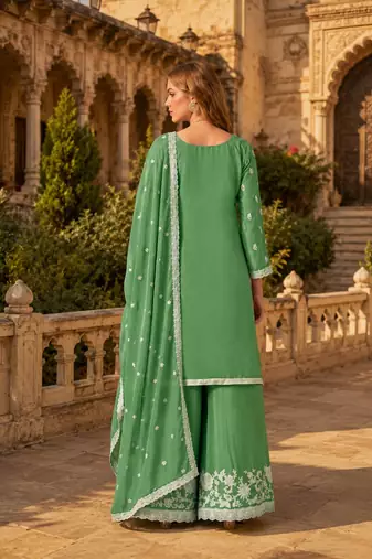 Green heavy chinon semi stitched palazzo suit with embroidey work