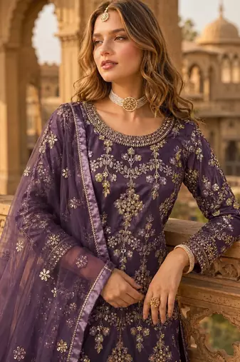 Purple heavy net semi stitched suit with embroidery work