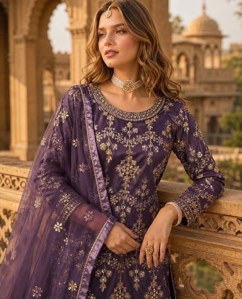 Purple heavy net semi stitched suit with embroidery work