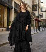Black net semi stitched sharara suit with heavy sequince work