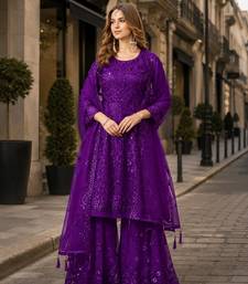 Violet net semi stitched sharara suit with heavy sequince work