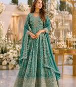Turquoise faux georgette semi stitched anarkali suit with embrodery work