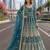 Teal embroidered net semi stitched anarkali suit