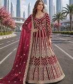 Pink embroidered net semi stitched anarkali suit