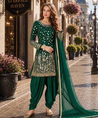 Dark green embroidered tapeta silk semi stitched salwar suit 1