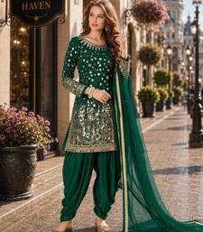 Dark green embroidered tapeta silk semi stitched salwar suit