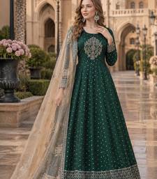 Green embroidered tapeta silk semi stitched anarkali suit